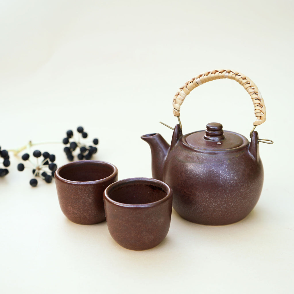Handmade small Chinese teapot with 2 cup in rustic in minimalism and effortless design. 