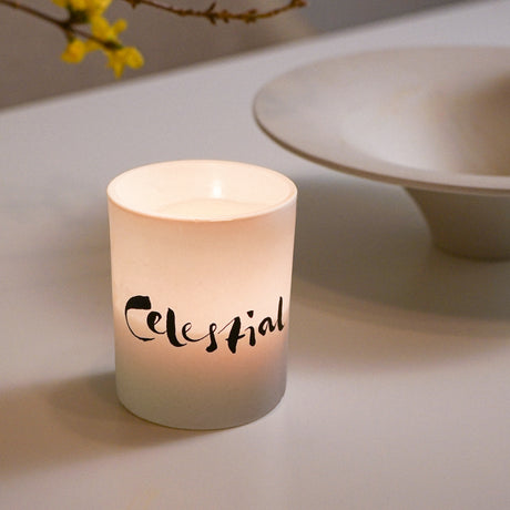 Dive into the inspirational scent of this special essential oil blend of neroli, sweet orange, lavender, lavandin and rosemary and enjoy the essential oil benefits of uplifting, de-stressing, yet transforming the room into a luxurious spa vibe. Hand poured natural wax in a white candle glass with a celestial brush painting design.  Notes : Neroli, sweet orange, lavender, lavandin and rosemary