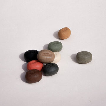 These handmade soaps in pebble design speak your mood out. Each soap has a mood wording on such as calm, fresh, serene, pure, relax and energize. Come in assorted colours in a box.