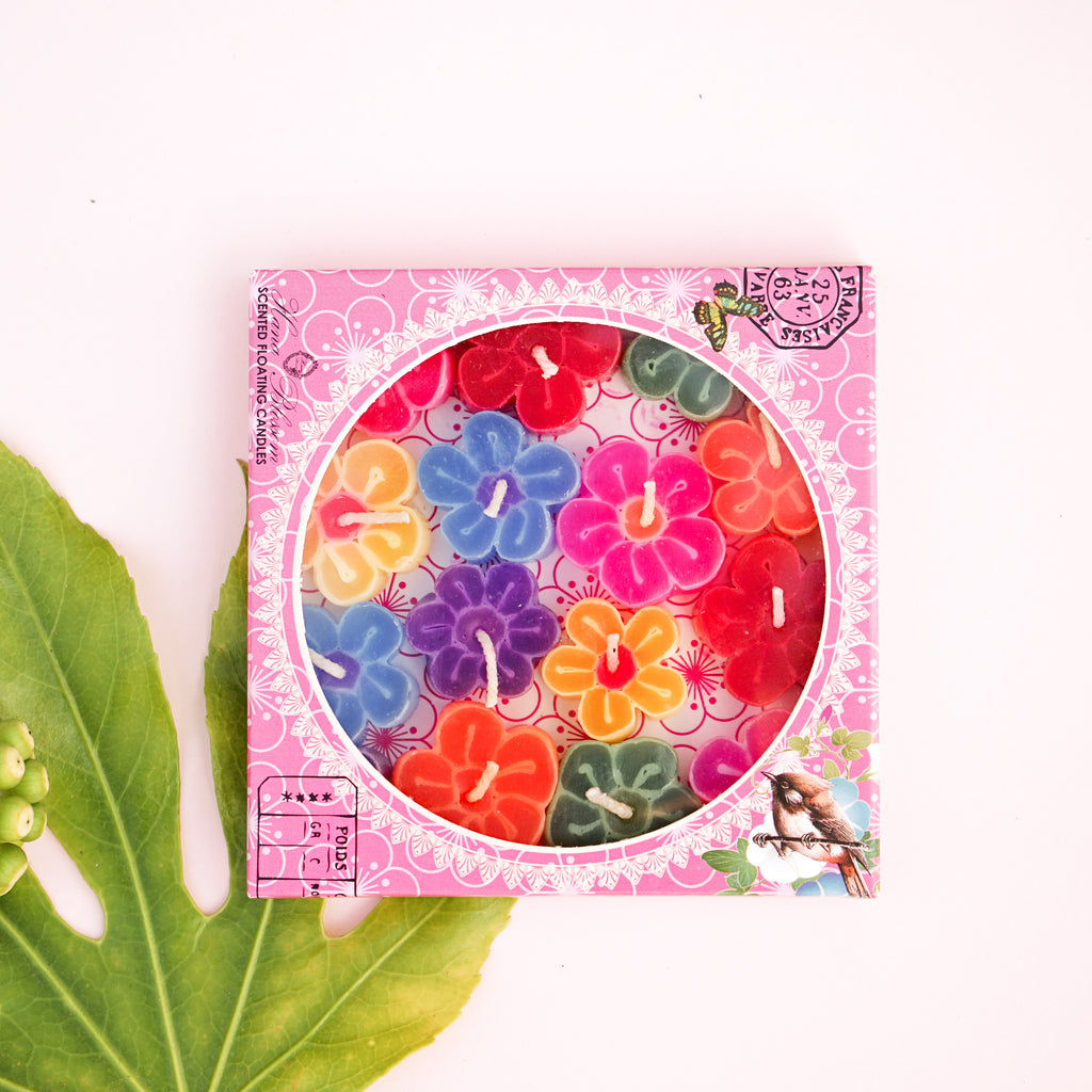 These assorted handmade flower scented floating candles are sweet like candies. Scented with floral fragrance. Approximately 14 flower candles in a lovely gift box. A sweet, colourful and fun gift idea.