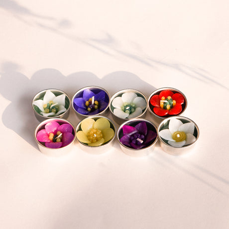 Free spirited and vibrant, we can't help not to fall in love. They are a bunch of Campanula, Buttercup, Escallonia, Blackberry and Clematis. Beautifully crafted, they bring joy to receivers.  Scented with Neroli essential oil a sweet, honeyed and relaxing. The flower tealights can be used with any standard tea light holders. Ideal wonderful gifts for birthday, housewarming or any special occasions.