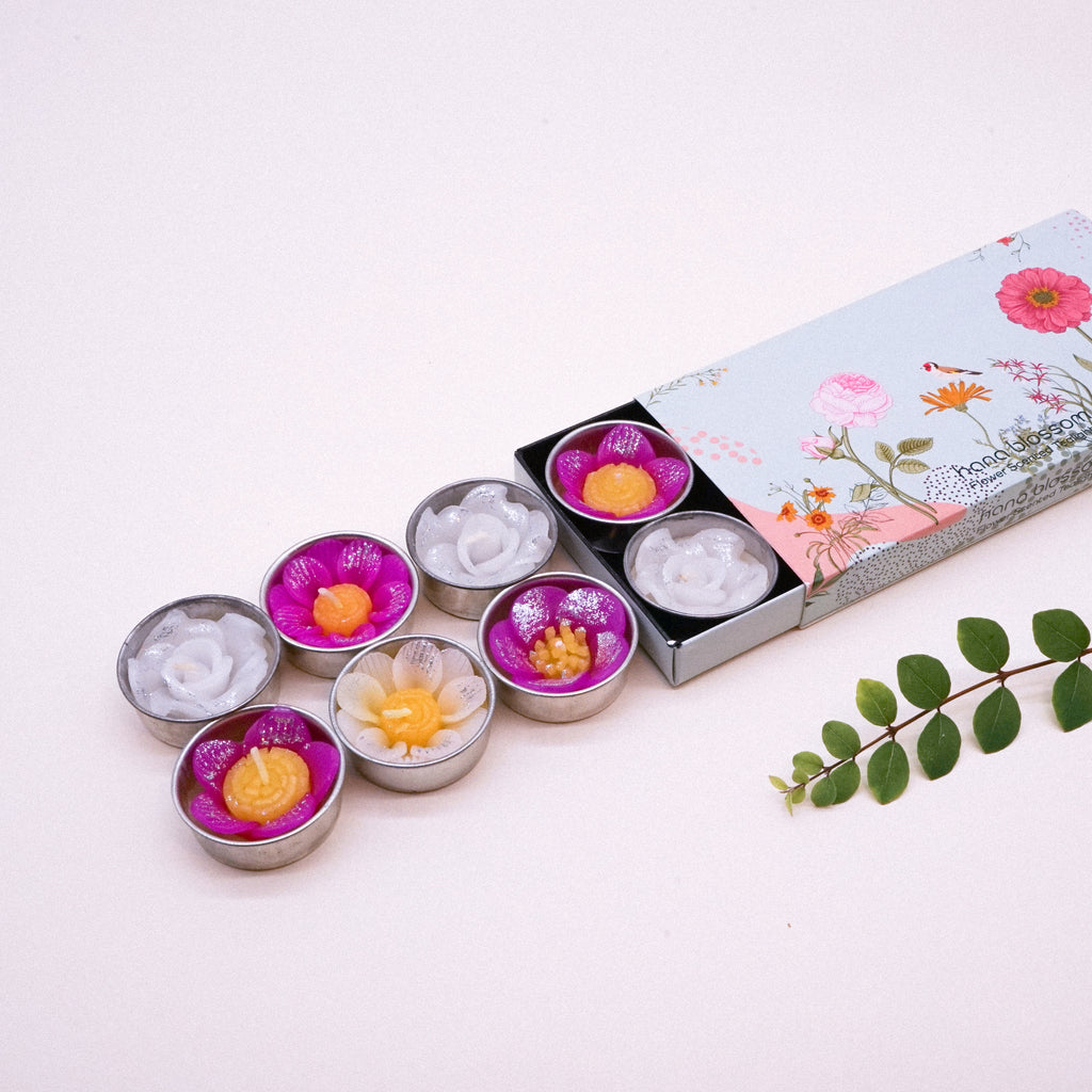 Add some glitter to the day with these beautiful assorted glitter flower scented tealights. The combination of white, pink and yellow with a dash of glitter powder creates joy and fun vibes. Scented with Neroli essential oil a sweet, honeyed and relaxing. Come in 8 assorted glitter flower tealights in a botanical garden design box. They can be used with any standard tealight holders.