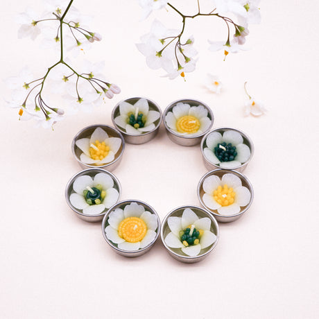 The beautiful assorted white garden flower scented tealights. Their pretty look makes them one of the most popular designs from our ranges. Scented with Neroli essential oil. The flower tealights can be used with any standard tealight holders. Ideal wonderful gifts for any special occasions.