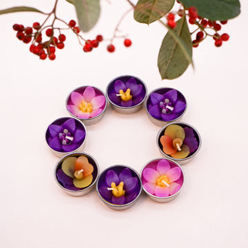 Assorted garden flower scented tealights in purple shade with a dash of yellow.  Scented with Neroli essential oil a sweet, honeyed and relaxing. The flower tealights can be used with any standard tea light holders. A lovely gift for someone who think purple is a new pink.